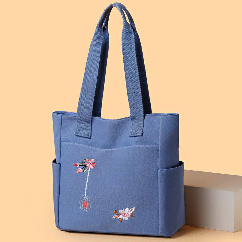 Top brand high-quality new free designer bag 2025 new fashionable embroidered handbag fashionable shoulder bag lightweight bucket bag brand new free d