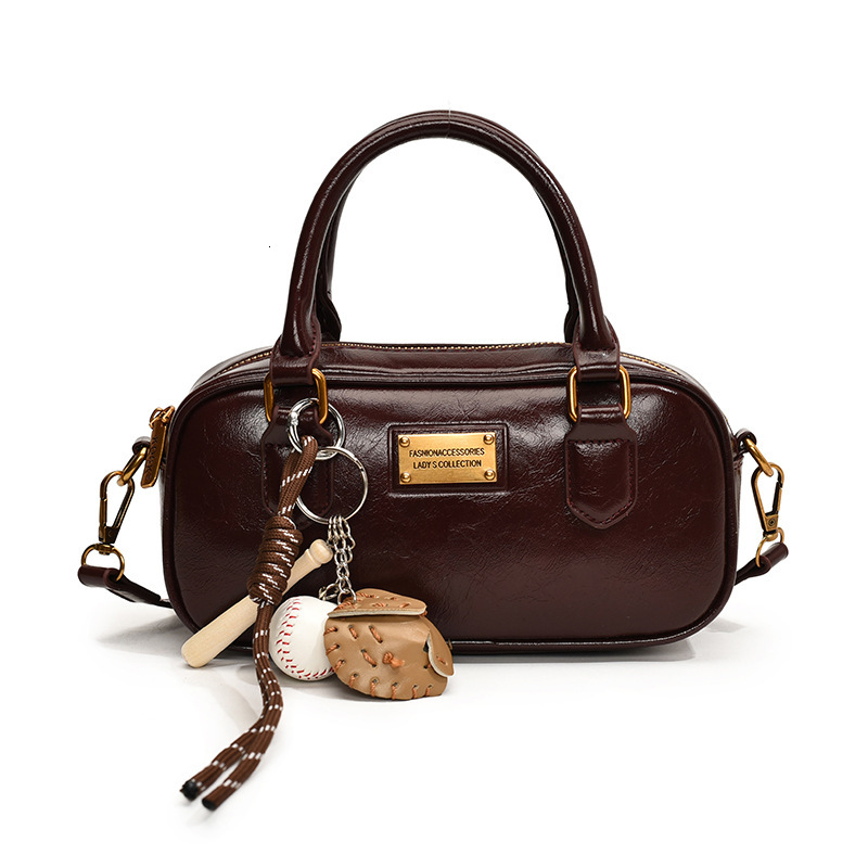 Free Shipping Designer Bag A Niche Bowling Womens Handbag Autumn Winter New Style Simple And Versatile Single Shoulder Crossbody Bag Boston Bag