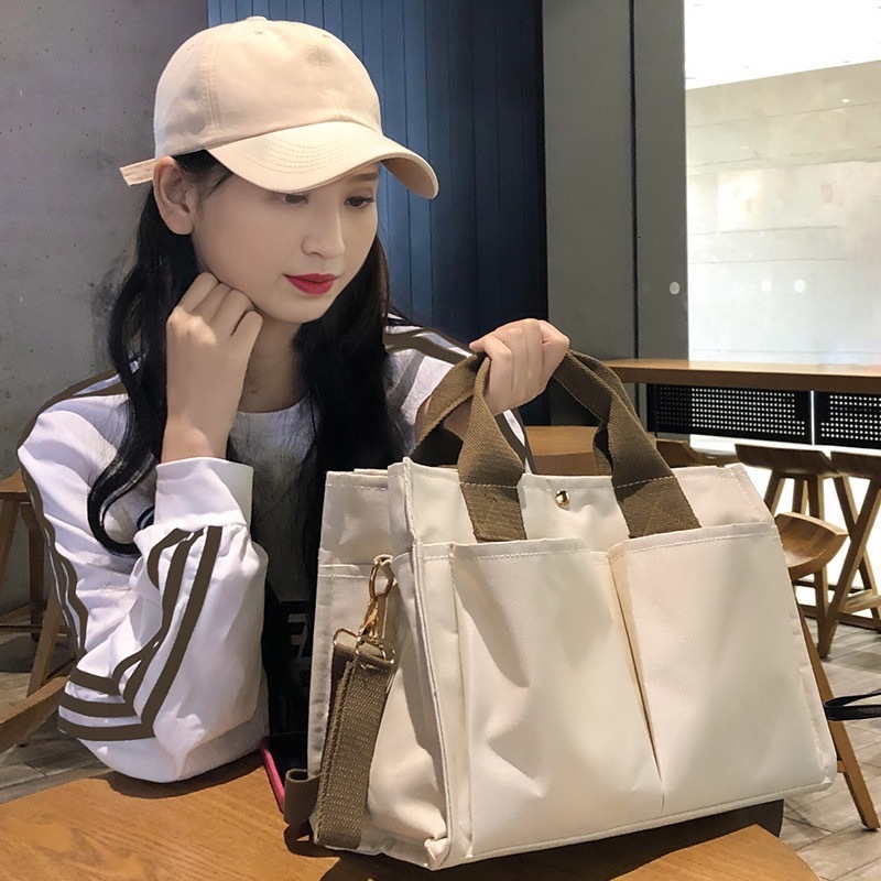 designer Korean Mommy Bag Multi-Compartment Baby and Mom Outing Lightweight Handheld Shoulder Bag Large Capacity Canvas Multifunctional Mommy Bag