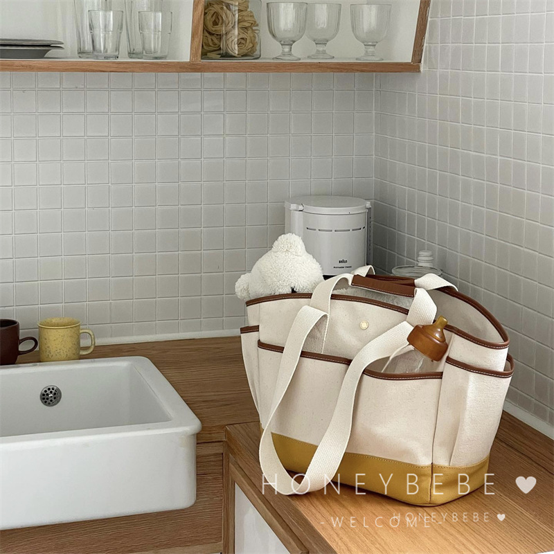 designer Korean INS Mommy Bag Large Capacity Casual Versatile Crossbody Mother and Baby Bag Outdoor Handheld Lightweight Canvas Mommy Bag