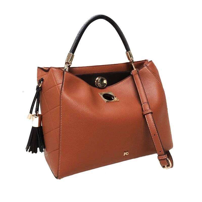 Designer bag 52 PG Fashion Elegant Popular Ladies Handbag Can Crossbody Niche Bags Unique Skeleton Buckle with Tassel Pendant New Brand Design