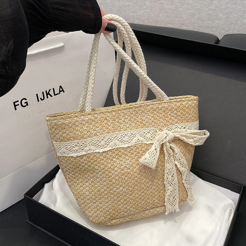Free Shipping Designer Straw Woven Handmade Bag Lace Large Capacity Seaside Vacation Straw Woven Bag Bow Design Sweet Shoulder Bag