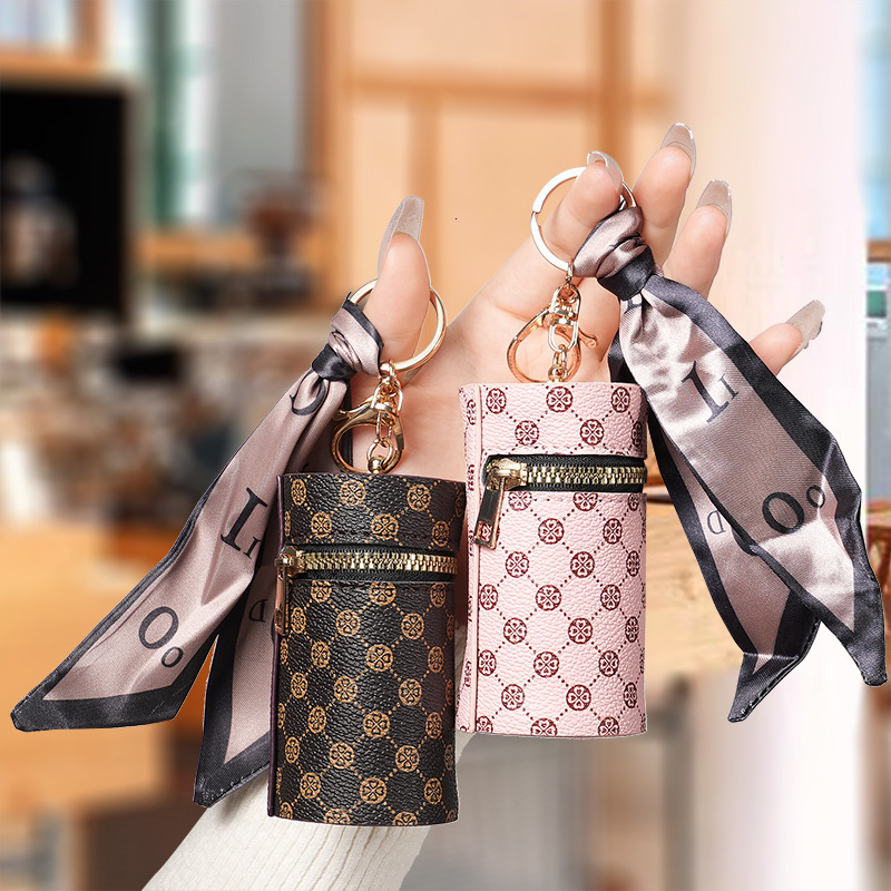 Cross border label coin wallet pendant headphone bag lipstick mini key bag retro bucket mouth red envelope designer men's key bag