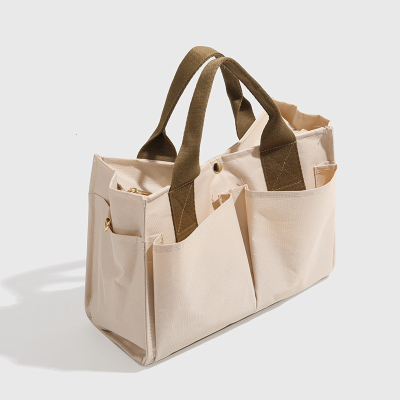 designer Korean Mommy Bag Multi-Compartment Baby and Mom Outing Lightweight Handheld Shoulder Bag Large Capacity Canvas Multifunctional Mommy Bag