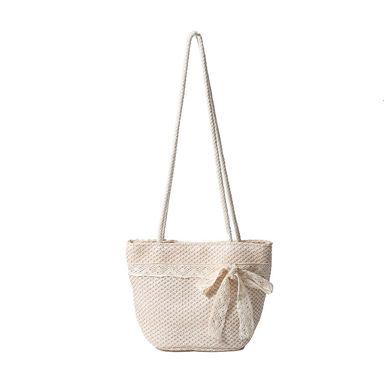 Free Shipping Designer Straw Woven Handmade Bag Lace Large Capacity Seaside Vacation Straw Woven Bag Bow Design Sweet Shoulder Bag