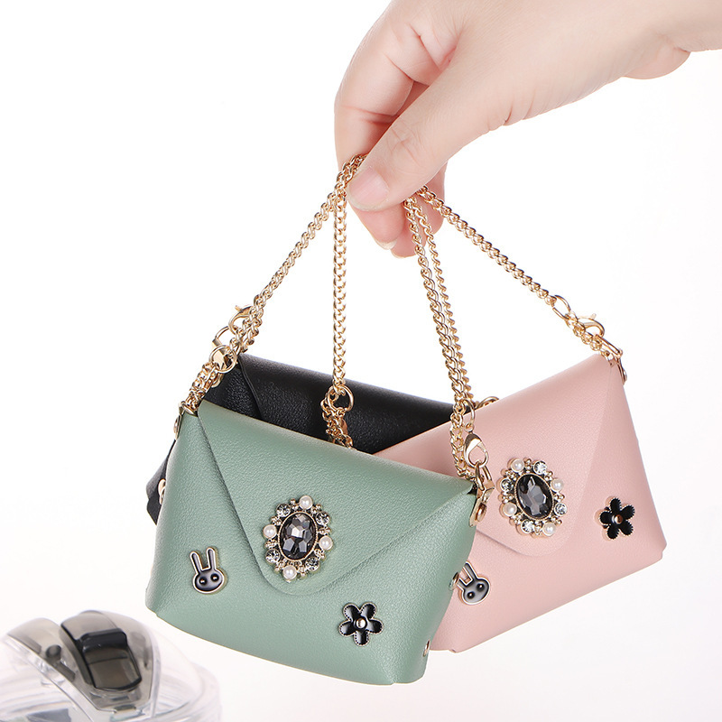 Simple and stylish artificial fashion leather coin wallet headphone storage bag chain handheld ten font dual use mini fashion bag designer men s key b