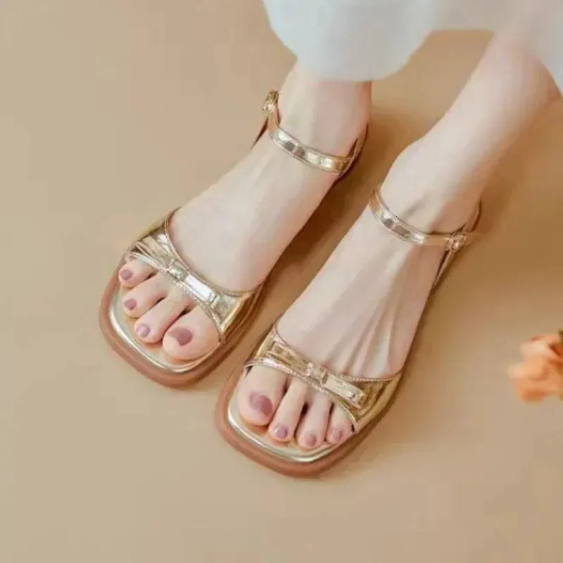Bow shaped buckle strap sandals for women with flat soles and thick heels. Summer Versatile Fashion Gold Silver 250528