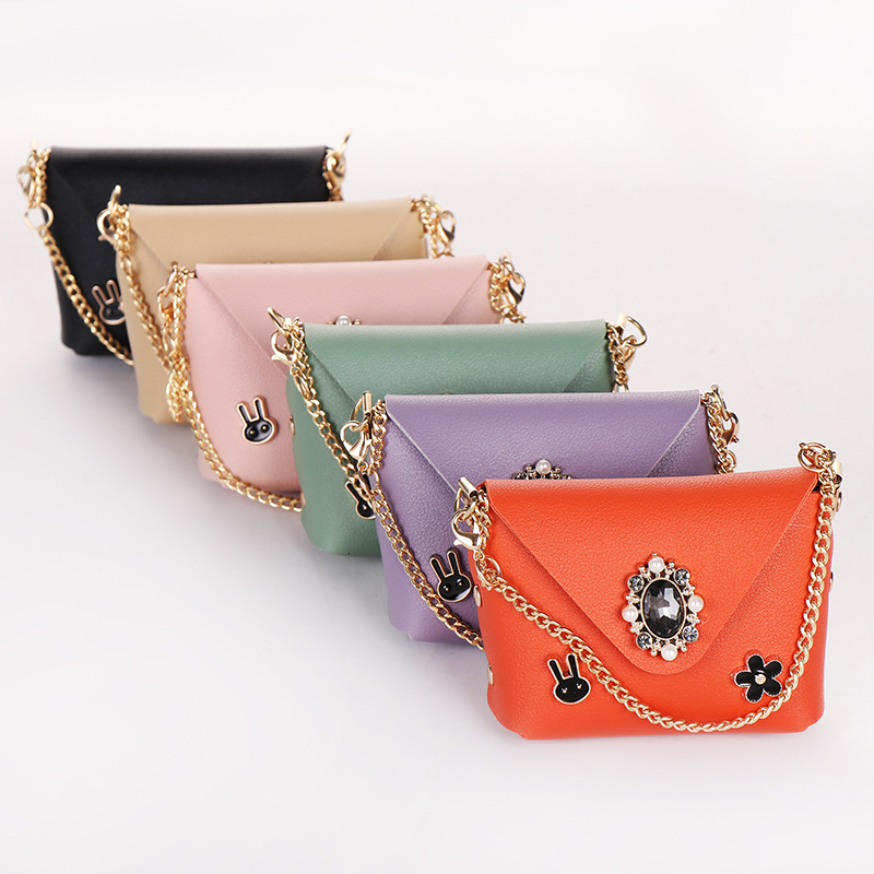 Simple and stylish artificial fashion leather coin wallet headphone storage bag chain handheld ten font dual use mini fashion bag designer men s key b
