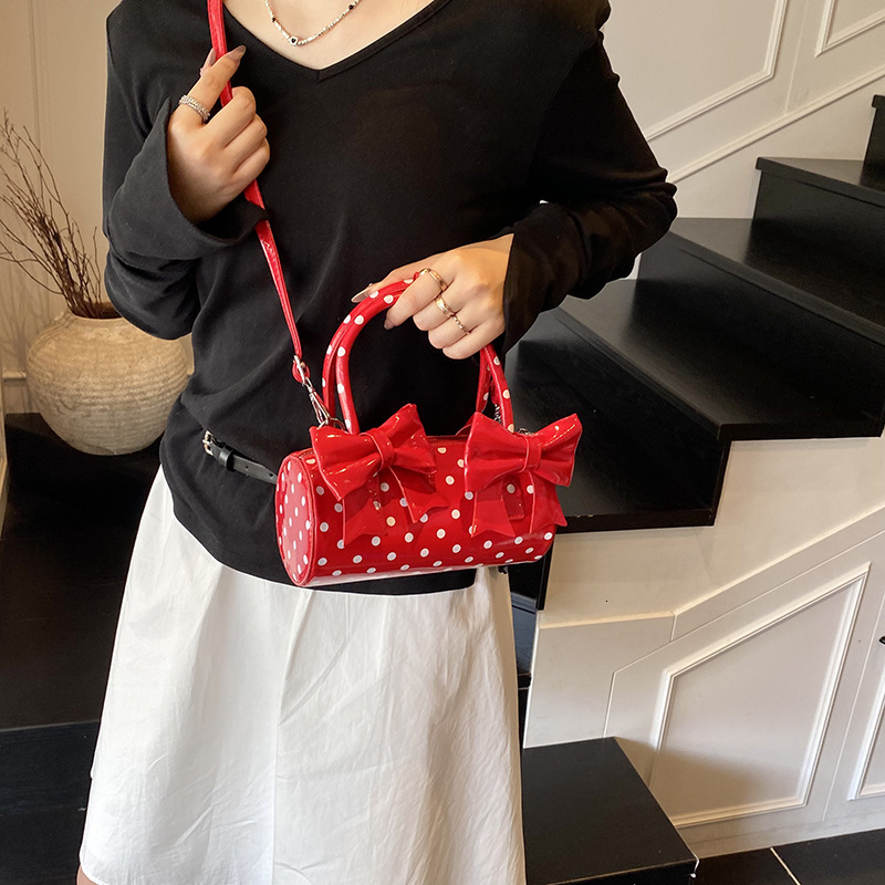 Top Brand High Quality New Style Dot Cake Women's Handbag 2025 New Textured Commuter Shoulder Bag Fashion Versatile Crossbody Bag New Free Delive