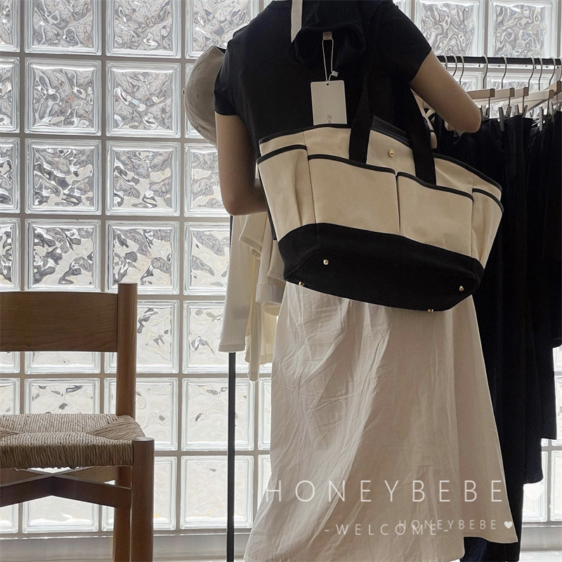 designer Korean INS Mommy Bag Large Capacity Casual Versatile Crossbody Mother and Baby Bag Outdoor Handheld Lightweight Canvas Mommy Bag