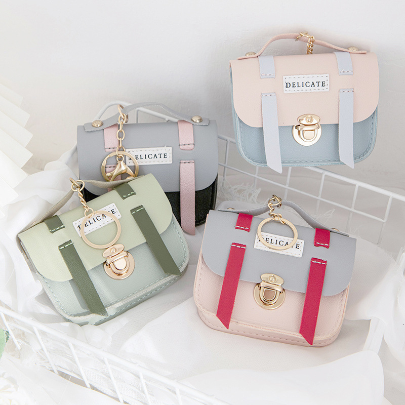 Cute ladies creative mini coin wallet fashion with lock keychain pendant fashion small wallet designer fashionable ladies handbag