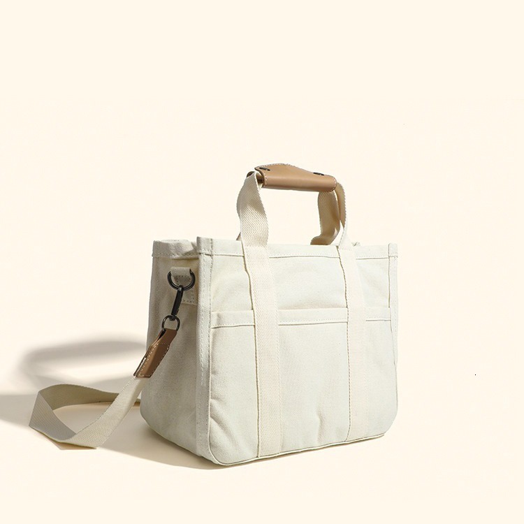 designer 2025 Korean Style INS Mommy Bag Fashion Multifunctional Mother and Baby Outing Single Shoulder Crossbody Handheld Canvas Mommy Bag