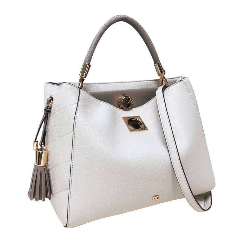 Designer bag 52 PG Fashion Elegant Popular Ladies Handbag Can Crossbody Niche Bags Unique Skeleton Buckle with Tassel Pendant New Brand Design