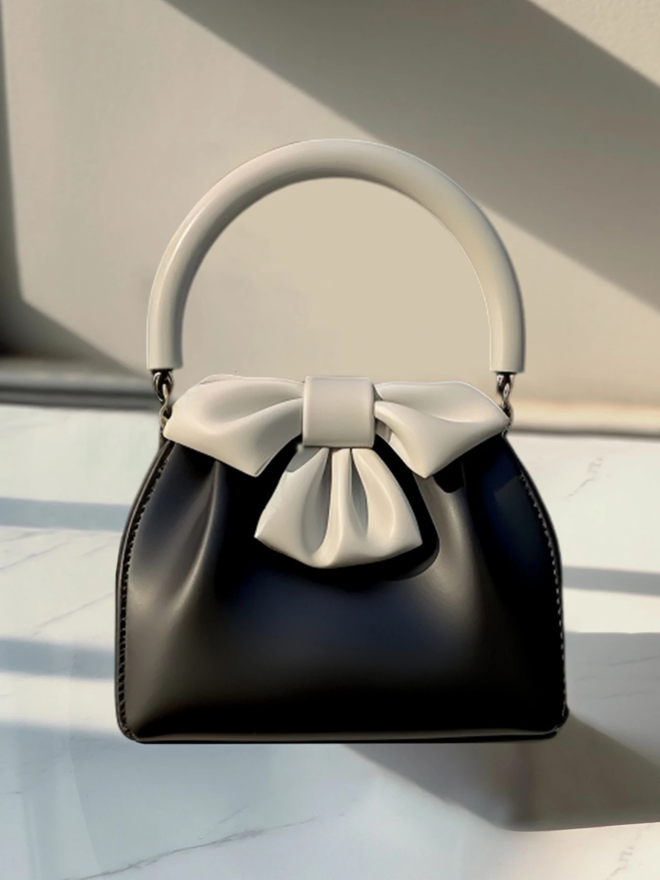 Fashionable and versatile color blocking small square bag with bow and pleated black handbag 250530