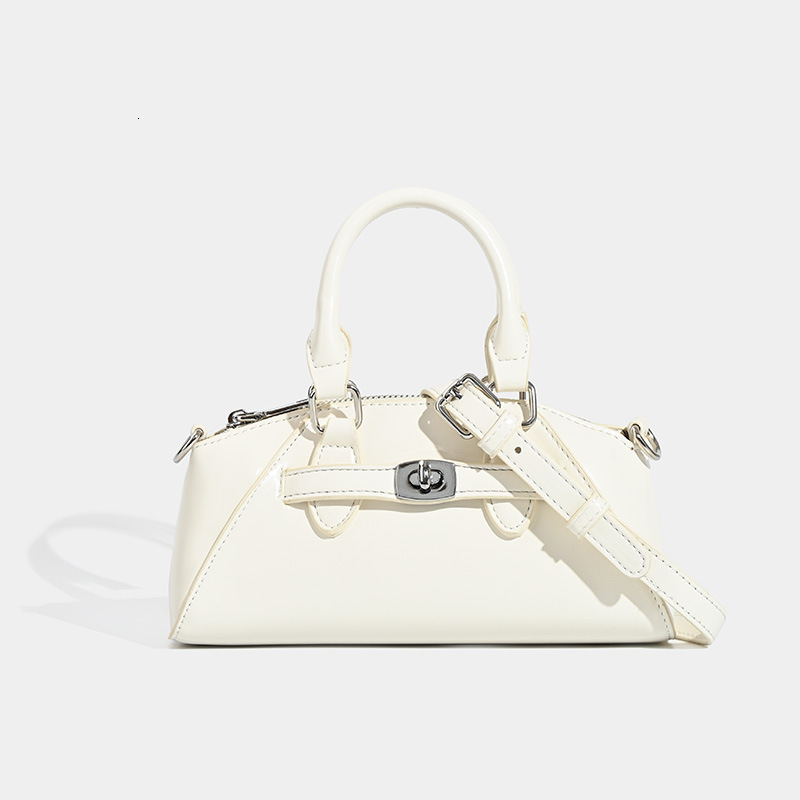 designer Light Luxury Style Bag for Women 2025 New Niche Simple Versatile Handheld Shell Bag Commuter Shoulder Crossbody Handbag