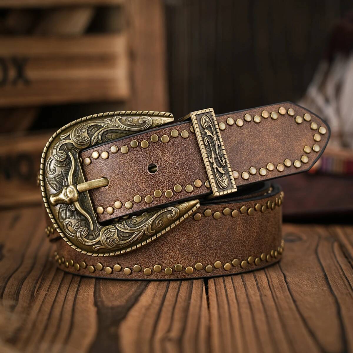A men's and women's vintage bull head relief metal buckle casual style brown riveted PU belt suitable for daily business attenda