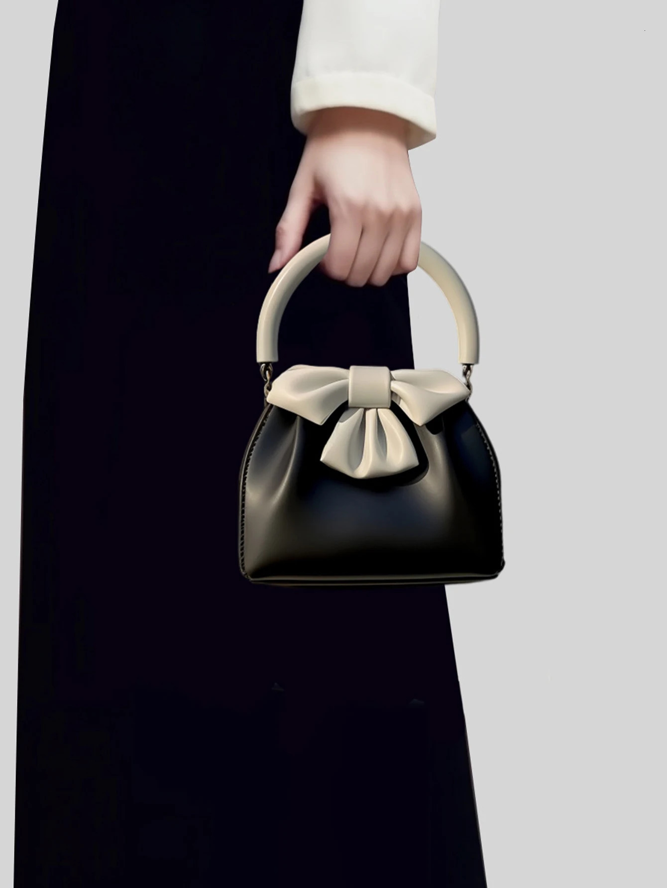 Fashionable and versatile color blocking small square bag with bow and pleated black handbag 250530