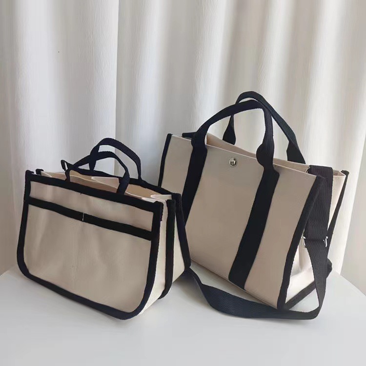 designer Korean Mommy Bag 2025 New Canvas Single Shoulder Crossbody Large Capacity Outdoor Multifunctional Mommy Baby Bag Simple