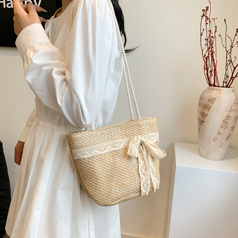 Free Shipping Designer Straw Woven Handmade Bag Lace Large Capacity Seaside Vacation Straw Woven Bag Bow Design Sweet Shoulder Bag