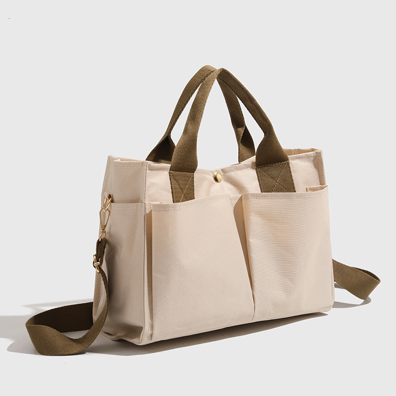 designer Korean Mommy Bag Multi-Compartment Baby and Mom Outing Lightweight Handheld Shoulder Bag Large Capacity Canvas Multifunctional Mommy Bag