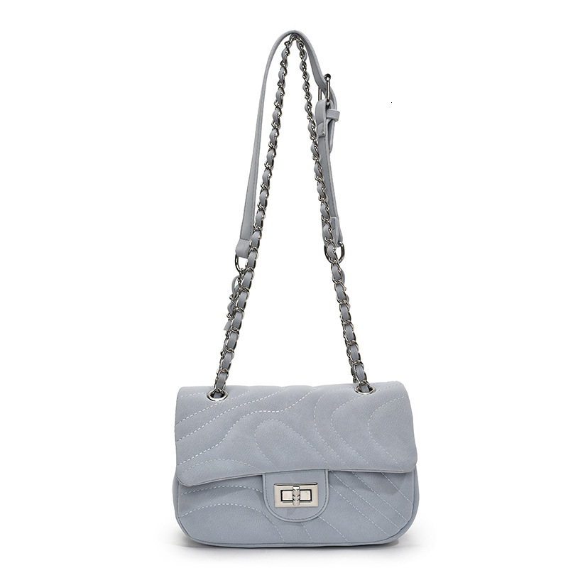 Free Shipping 2025 New High-end Versatile Underarm Bag Designer Bag Beach Bag Small Chanel Style Striped Commuter Shoulder Bag Chain Texture Crossbody
