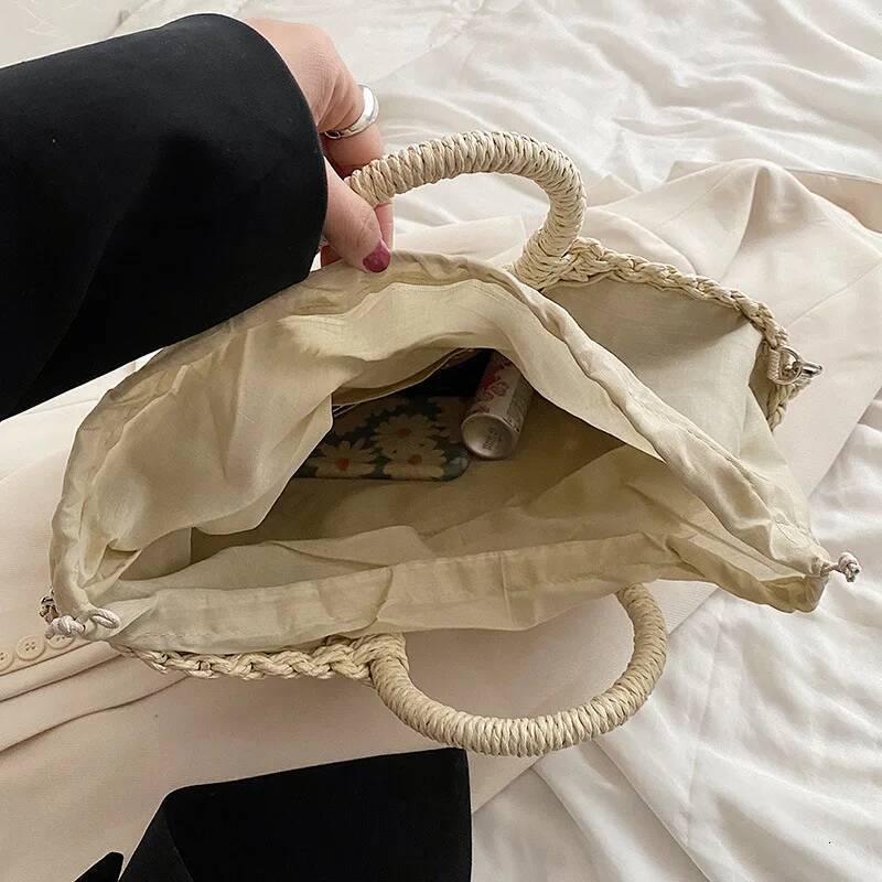 2025 New Straw Weaving Designer Women's Handcrafted Travel Seaside Beach Bag Summer New Handle Bucket Bag Shopping Handbag Basket