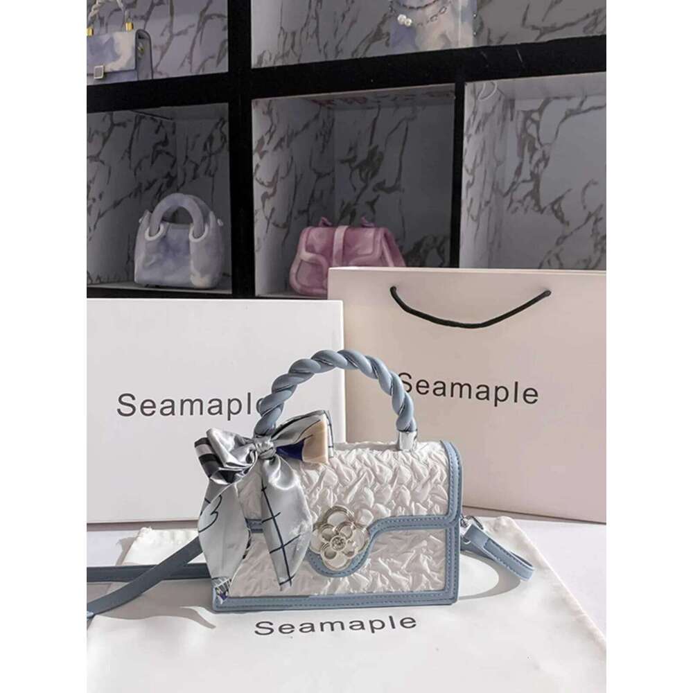 2024 New Fashion Popular Handheld Square With Contrast Color And Delicate Flower Metal Decoration Shoulder Messenger Bag