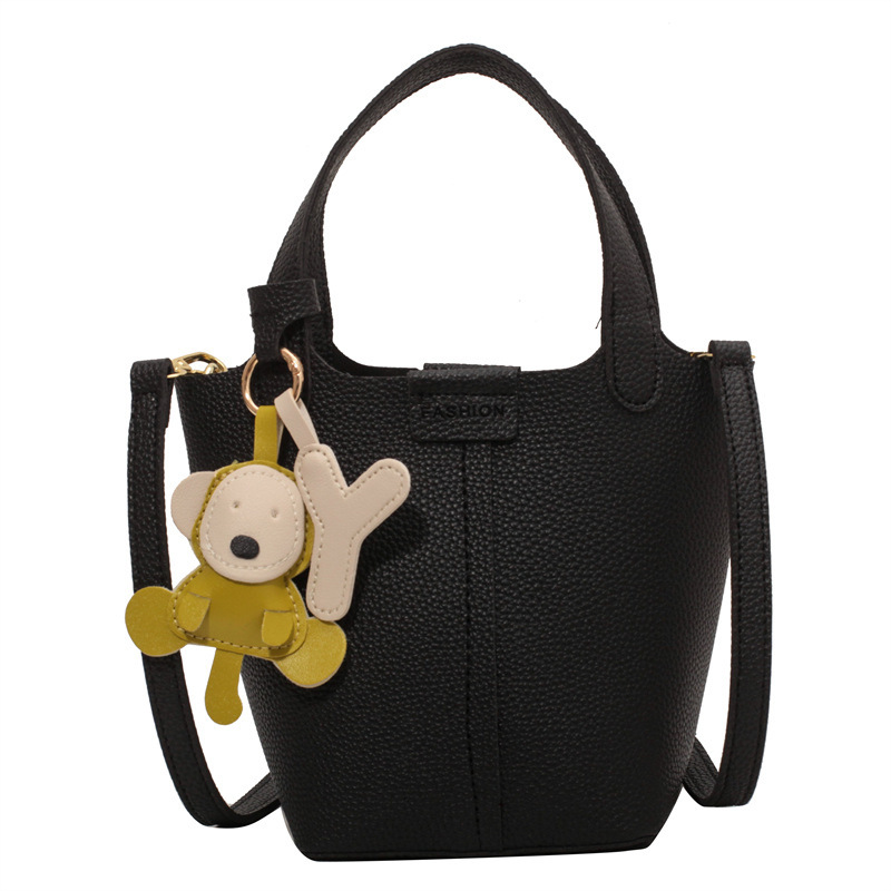 Women's bucket bag new fashionable shoulder bag with cute monkey pendant crossbody bag designer women's crossbody bag