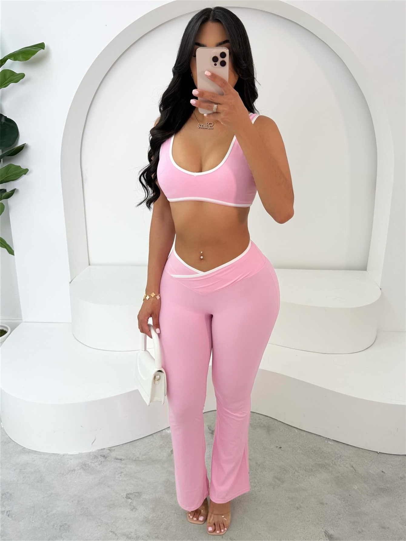 Designer T Shirt European And American Summer Sports Fashion Strap Top With Exposed Navel And Back Tight Fitting Hip Lifting Sports Pants Set Essentia