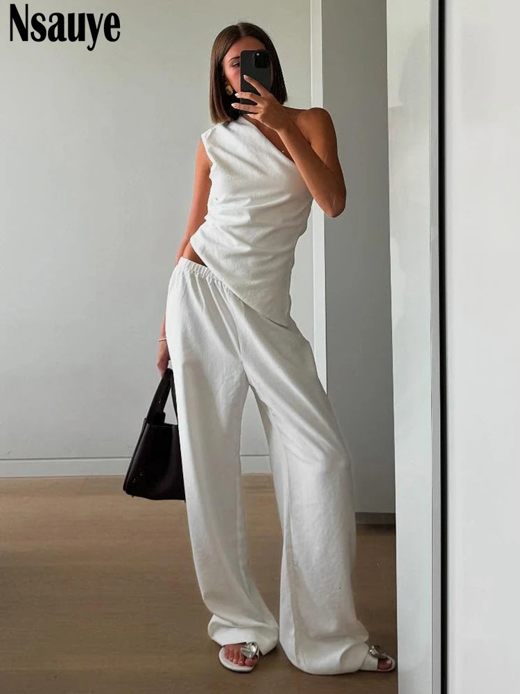 Nsauye Summer Casual Women Fashion Tracksuit Pants Two Piece Set White Hollow Out Backless Skinny Tops Long Pants Sexy Set 2025 250530