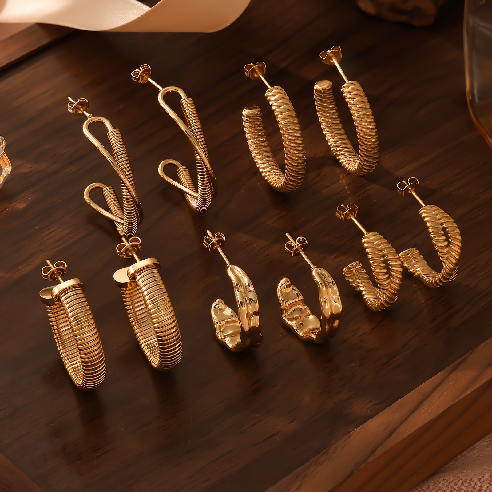 Internet Celebrity Gold Stainless Steel Twisted Hoop Light Earrings High-End Feel