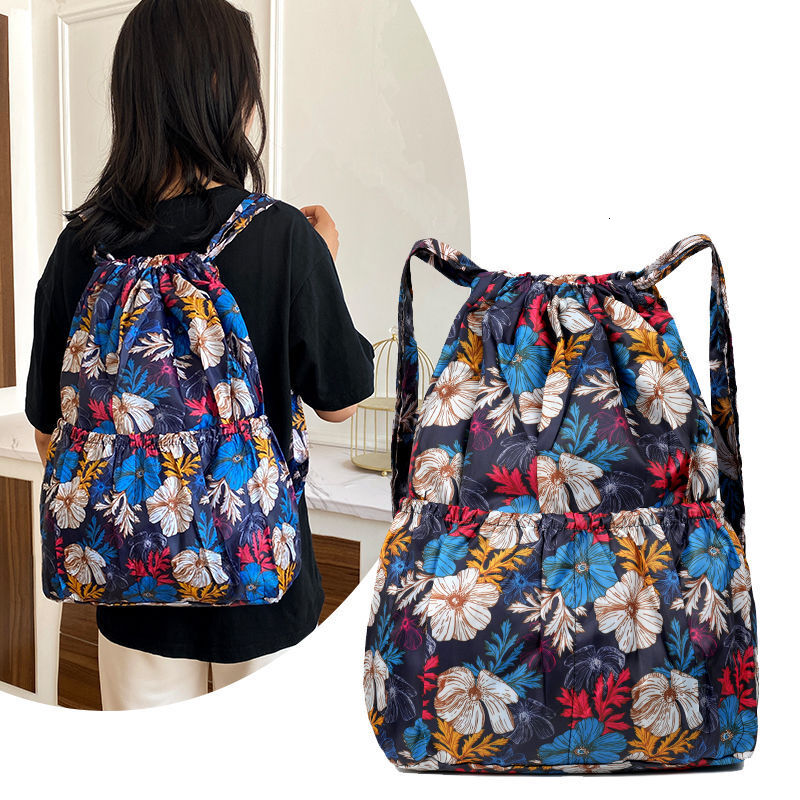 Free Shipping Backpack Versatile Nylon Drawstring Bag Outdoors Women Outdoor Sports Bag Large Capacity Designer Bag Mommy Bag Lightweight Travel Backp