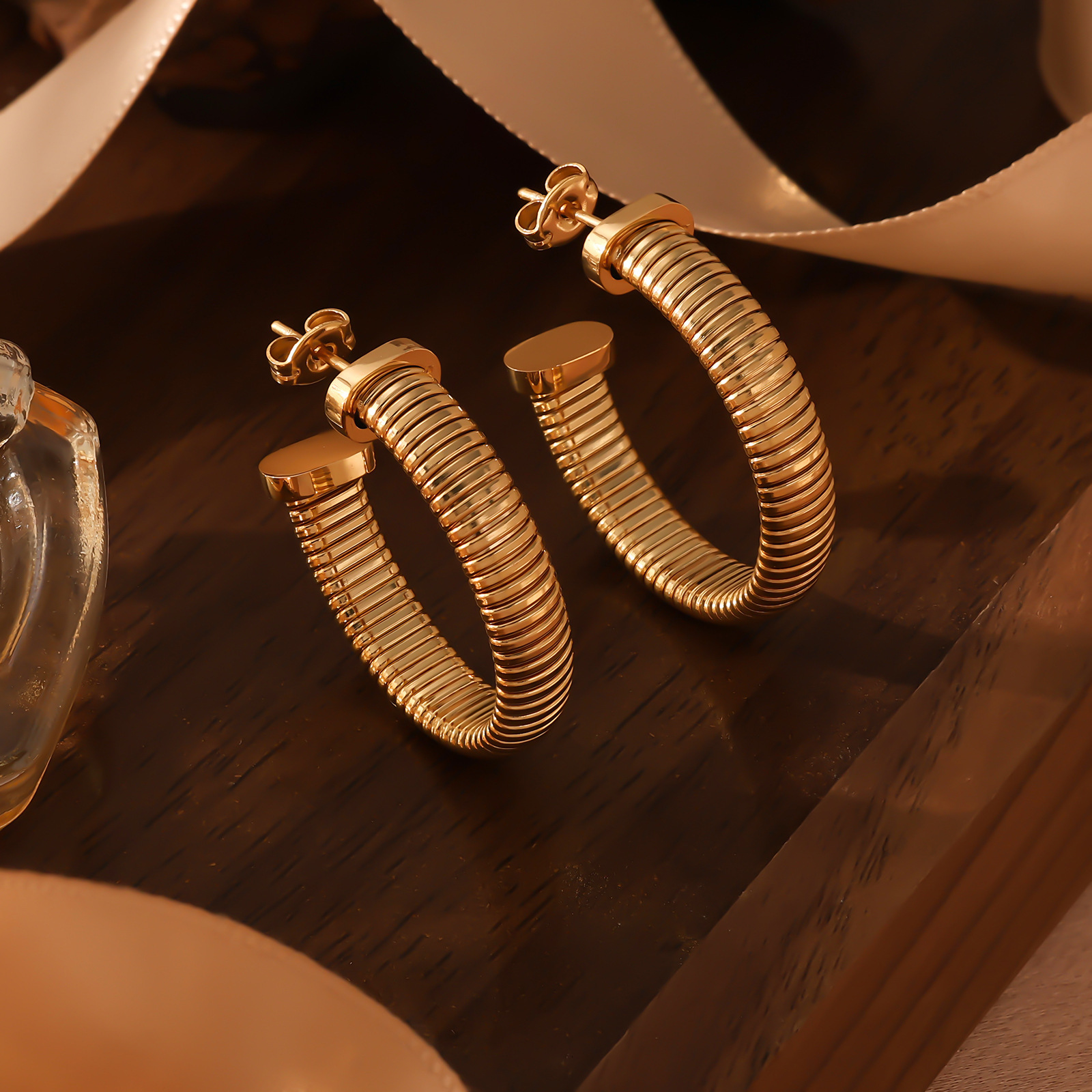 Internet Celebrity Gold Stainless Steel Twisted Hoop Light Earrings High-End Feel