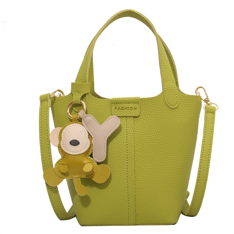 Women's bucket bag new fashionable shoulder bag with cute monkey pendant crossbody bag designer women's crossbody bag