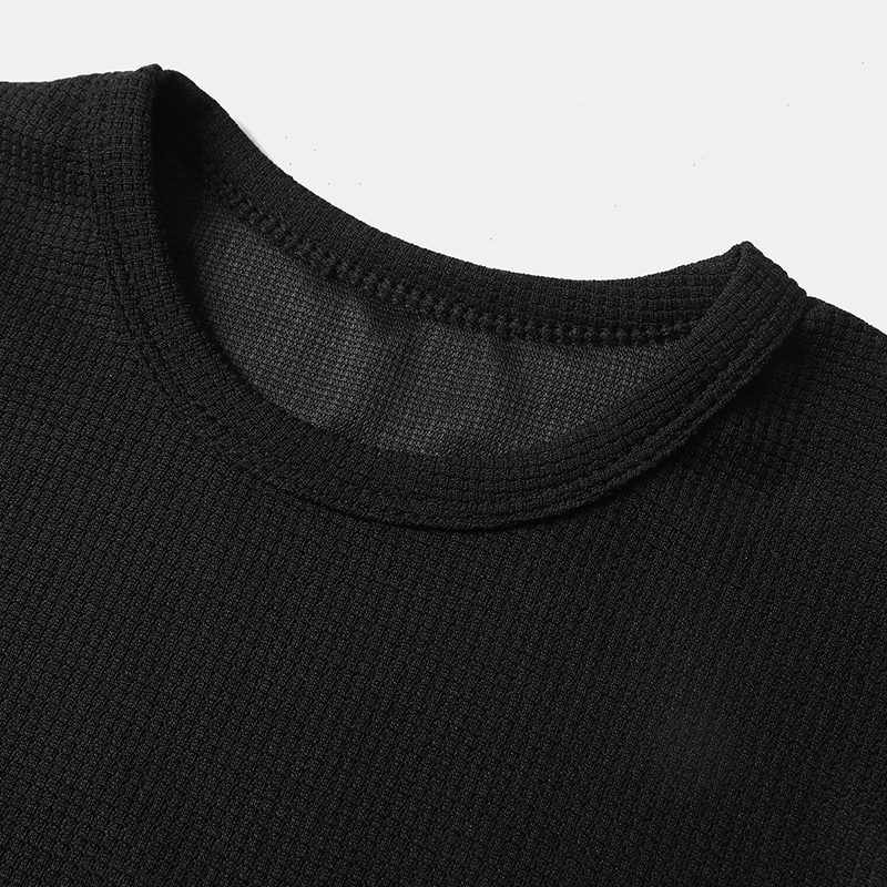 Summer boys' shorts set with waffle style short sleeves and letter printed shorts, suitable for children aged 4-12, featuring a stylish casual ou