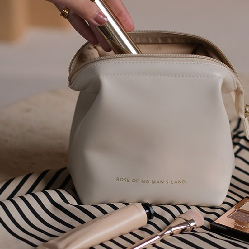 designer Cross-border 2025 New PU Shell Makeup Bag Korean Version Ins Style Internet Celebrity Portable Small Travel Toiletry Bag for Women