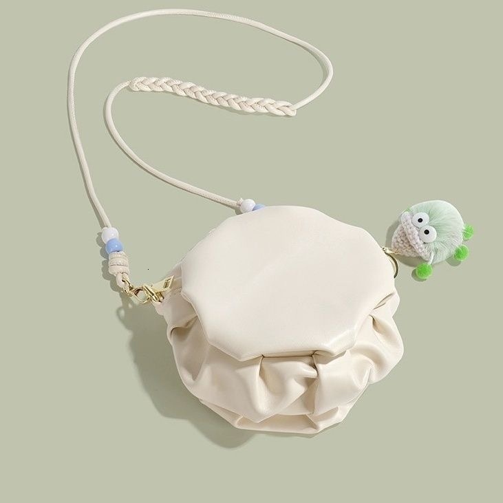 Cute girl fashion pleated leather small round bag for women s summer new single fashion shoulder crossbody bag designer women s single shoulder bag