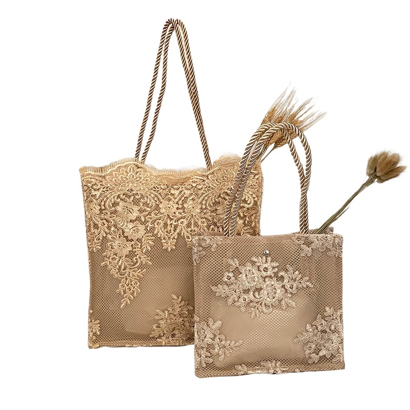 designer 2025 Embroidered Hollow Matte Silk Hot-Selling Straw Woven Handbag Travel Vacation Beach Bag Lace Bag