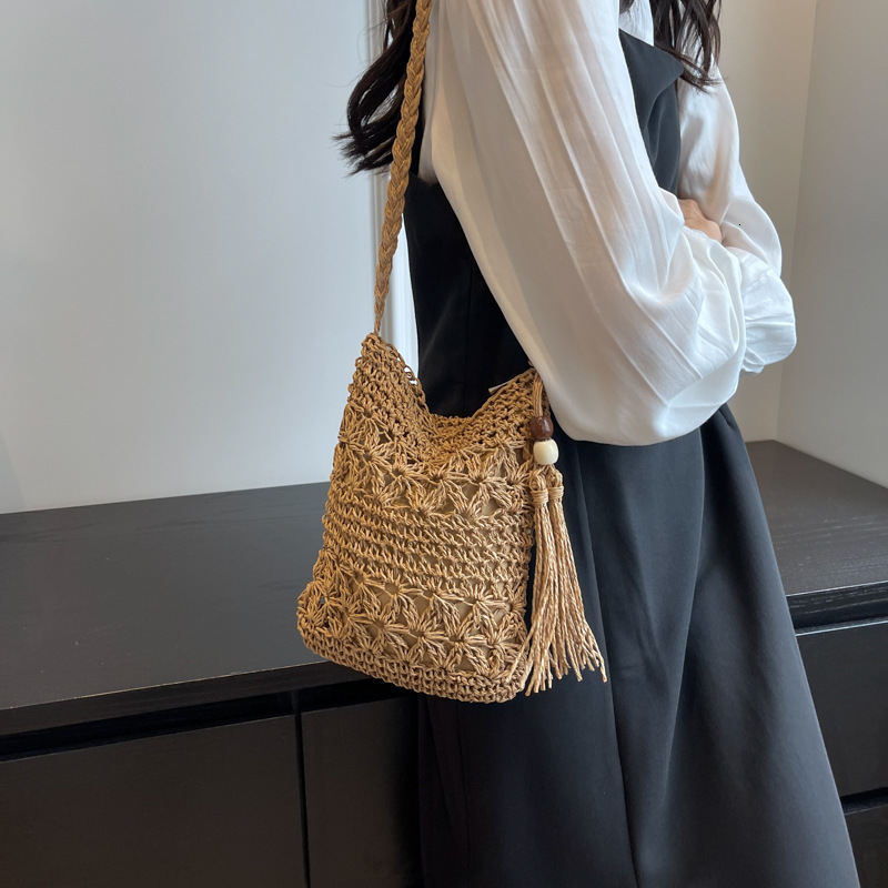 designer 2025 New Hollow Beach Vacation Bucket Bag for Women Korean Style Handwoven Fashion Single Shoulder Crossbody Bag