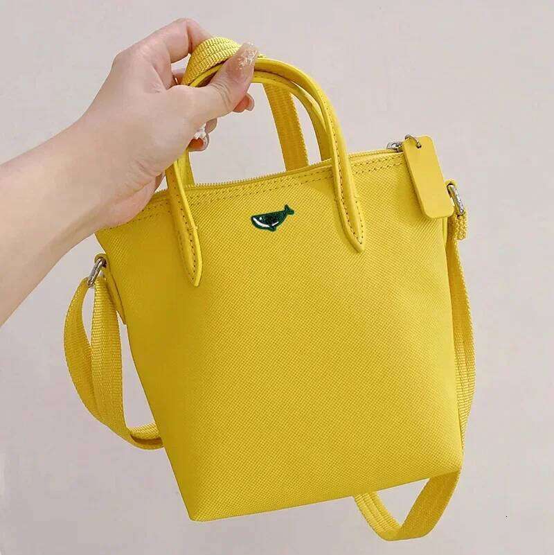 Mini French New Short Handle Mobile Phone Women's Single Shoulder Slant Cross Dumpling Small Tote Bag
