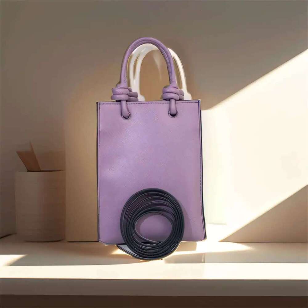 Fashionable Women's Tour Strap Handbag With Simple Design And Large Capacity