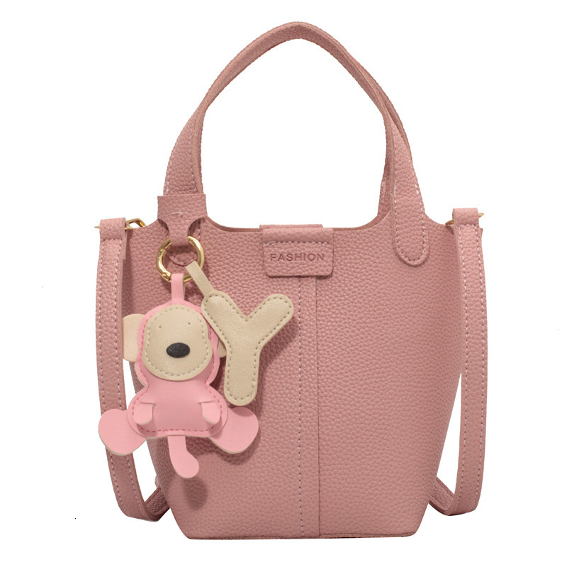 Women's bucket bag new fashionable shoulder bag with cute monkey pendant crossbody bag designer women's crossbody bag