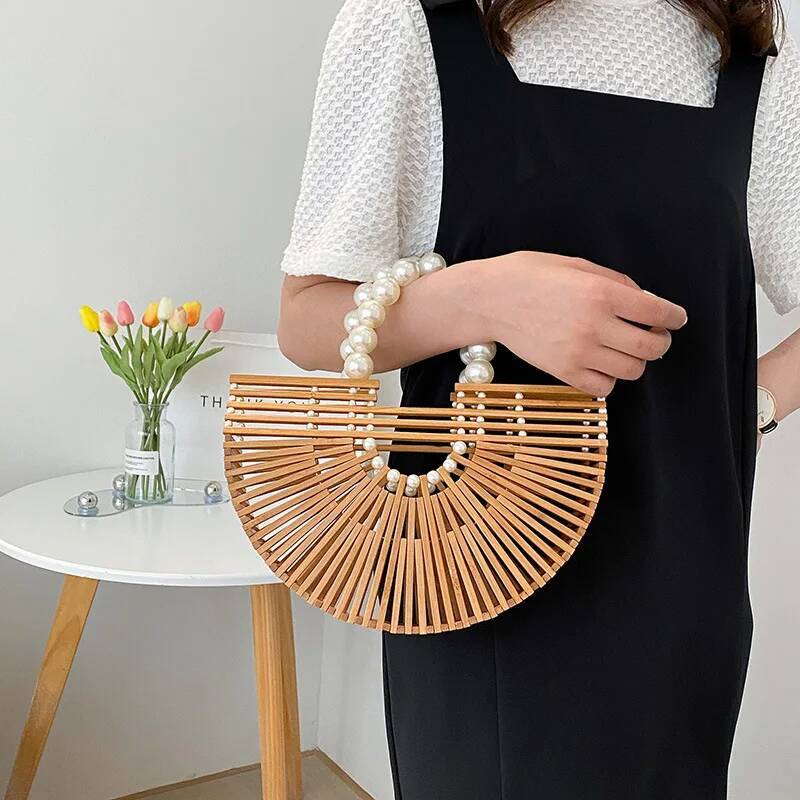 2025 new hand woven handbag, handheld beach bag, hollow semi-circular bamboo woven bag, designer fashion vacation bag 3