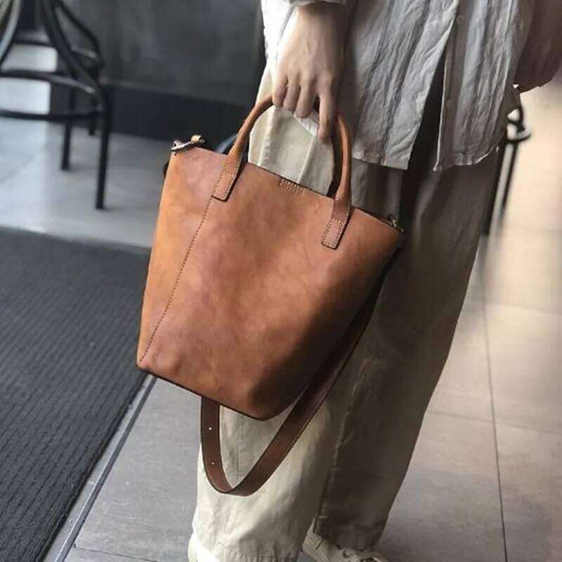 2025 First layer leather female vintage casual bucket Korean version hand bag shoulder crossbody bags cowhide