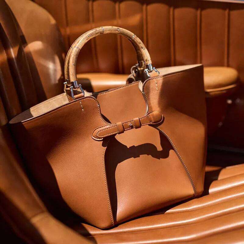 Spring/Summer New Canvas Grass Woven Bamboo Handle Vegetable Basket Women's Butterfly Knot Handbag Beach Bag