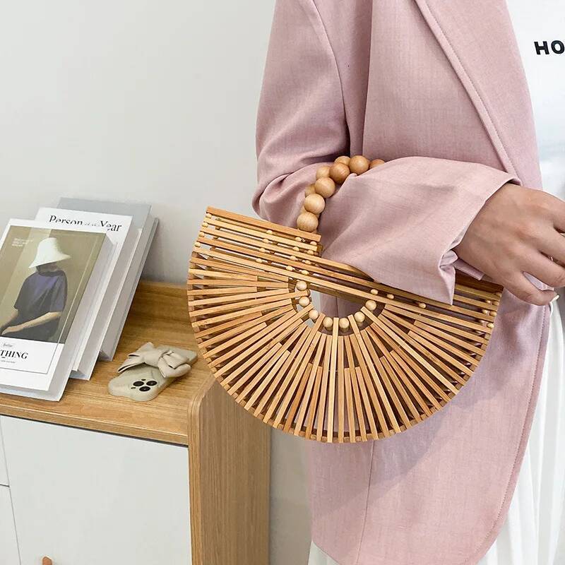 2025 new hand woven handbag, handheld beach bag, hollow semi-circular bamboo woven bag, designer fashion vacation bag 3