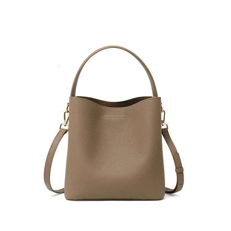 Elegant retro hand-carried water bucket top layer cowhide multi-layered strap lock tote bag single shoulder cross-body