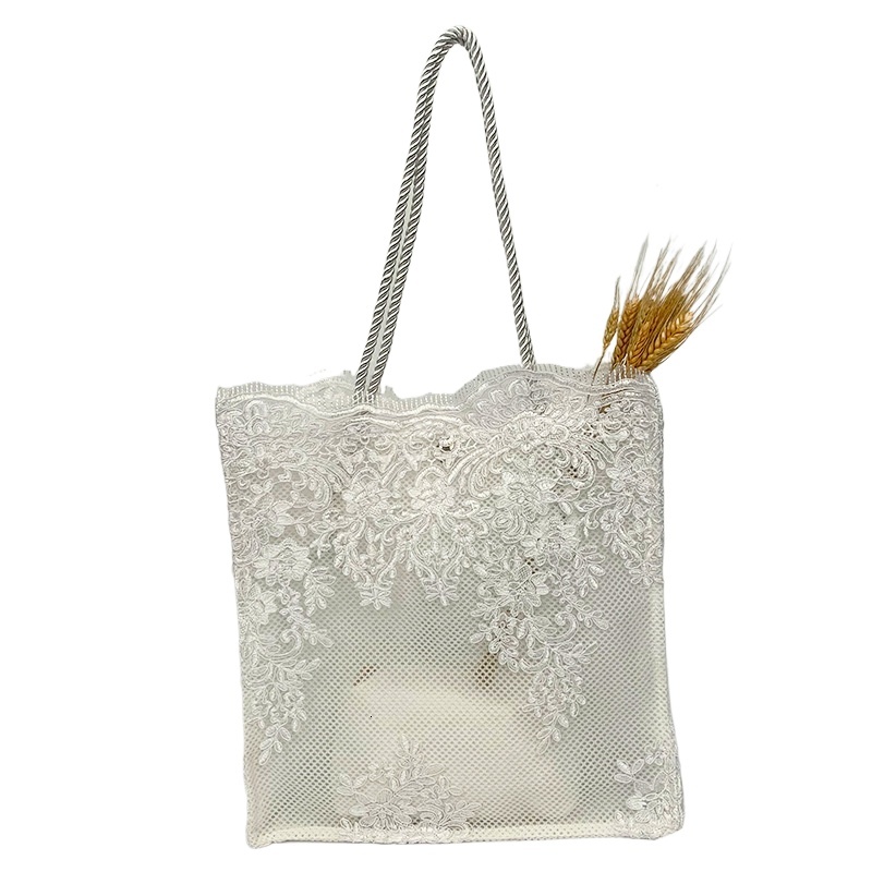 designer 2025 Embroidered Hollow Matte Silk Hot-Selling Straw Woven Handbag Travel Vacation Beach Bag Lace Bag