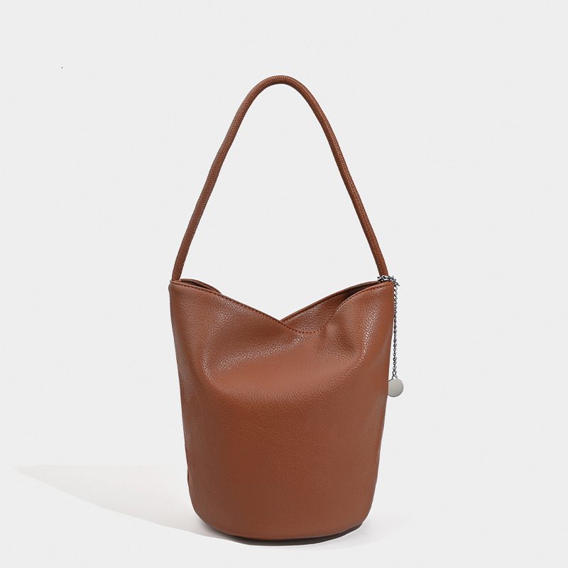 designer 2025 New Korean Niche INS Litchi Grain Soft Leather Simple Bucket Bag Fashion Versatile Shoulder Underarm Bag for Women