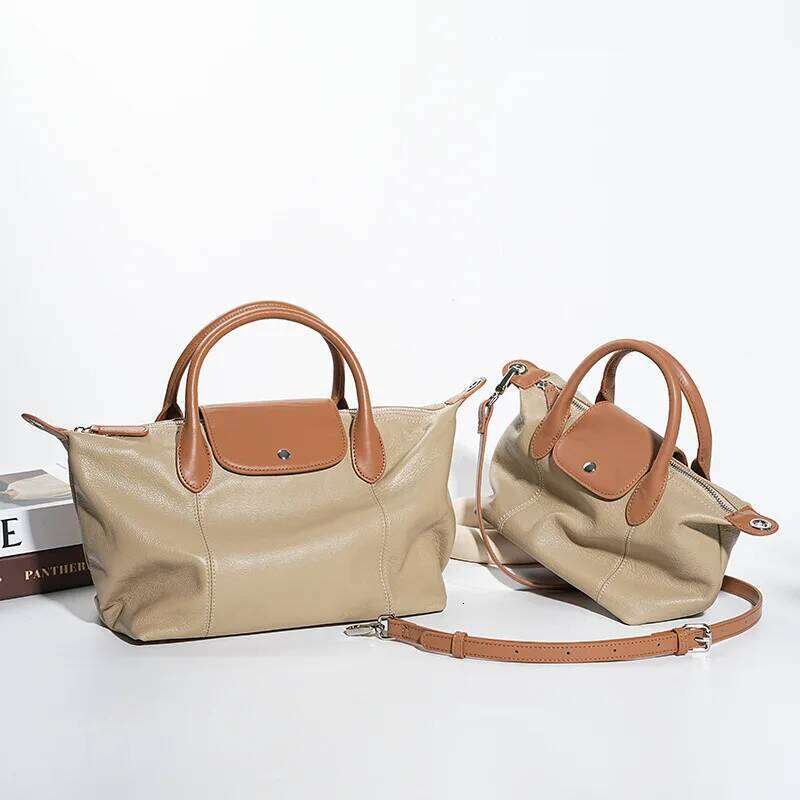 New top layer cowhide fashionable dumpling bag high-quality leather with contrasting colors large capacity handbag for women